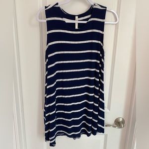 Striped sleeveless dress. Stretchy and soft material. Loose flowy fit. Size M.